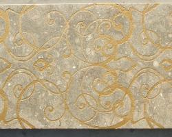 Mármol beige decorado con oro