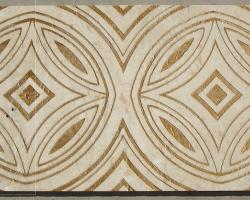 Mármol beige decorado con oro