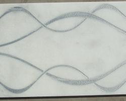 Mármol blanco decorado con plata